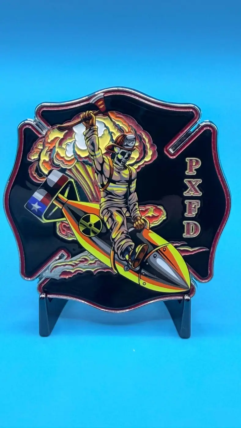 Fire department challenge coin with Maltese cross and flame artwork