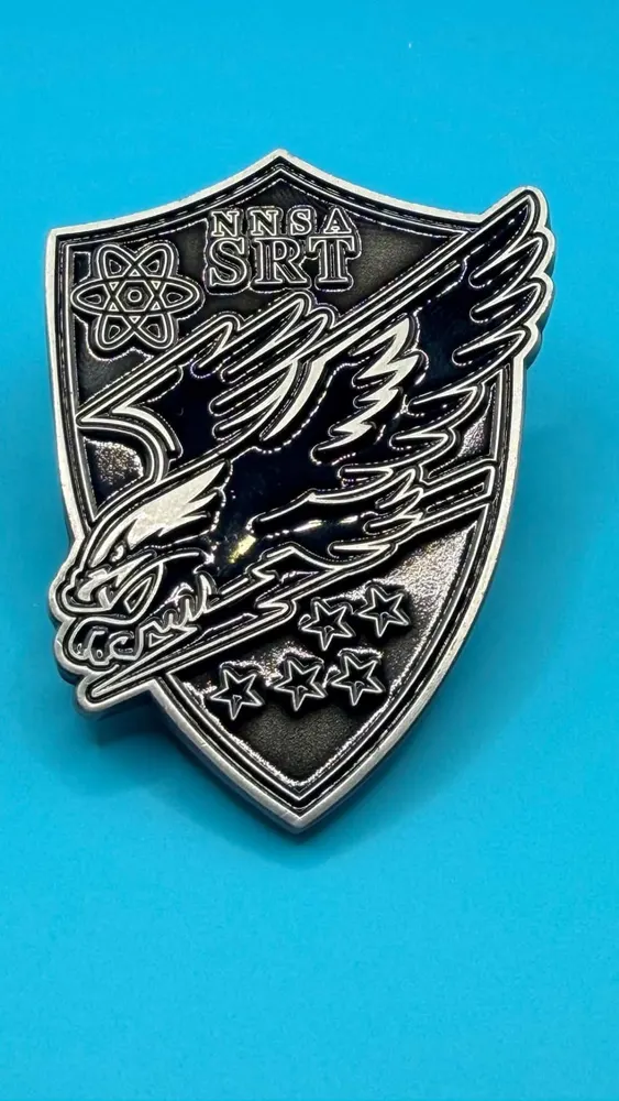 Front of the SRT Team challenge coin