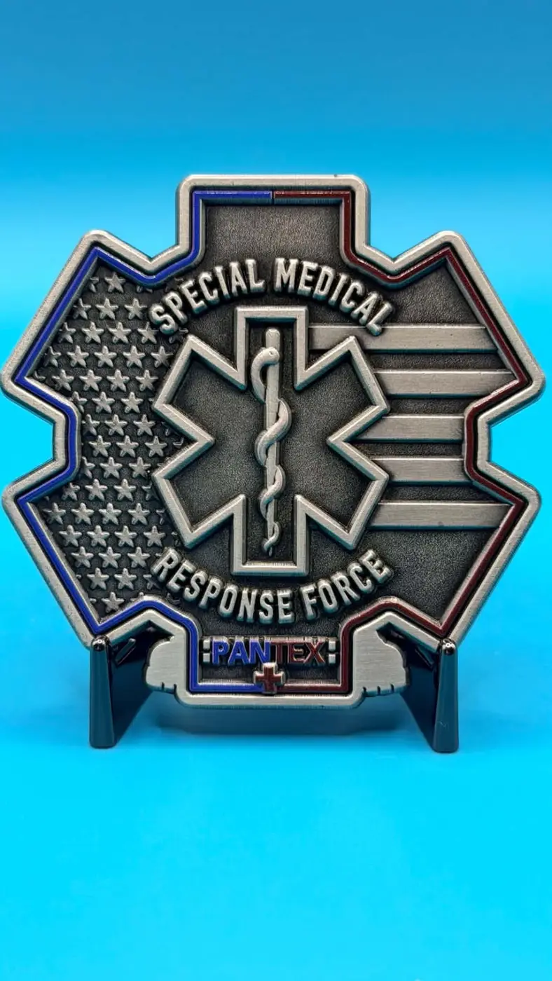 Back of the coin showing the Star of Life over the American flag with Special Medical Response Force lettering