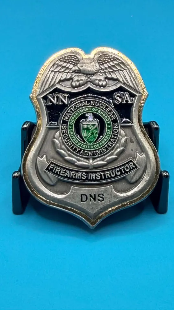 Front of the Original Badge DOE Security challenge coin