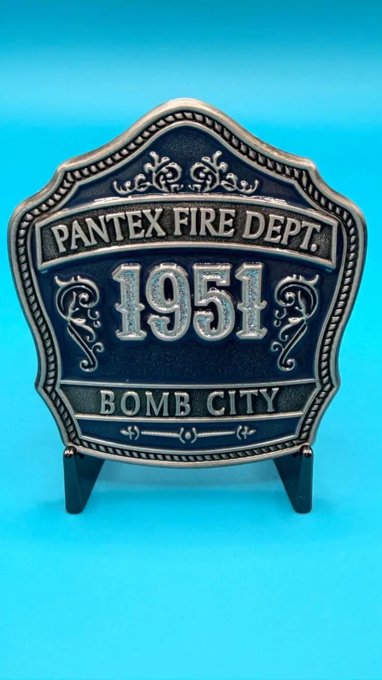 Back of the coin showing Pantex Fire Dept. 1951 Bomb City in silver and blue enamel