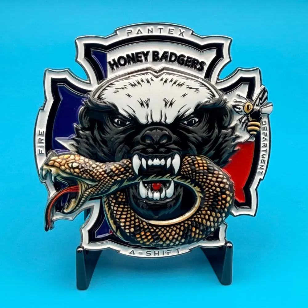 Front of the Honey Badger A Shift challenge coin