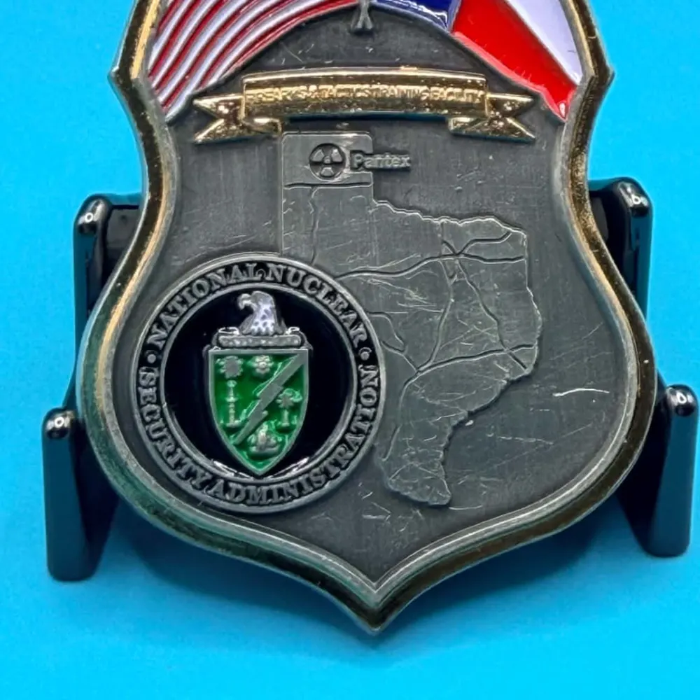 Front and back detail of custom NNSA — National Nuclear Security Administration challenge coin design by Jericho Seven.